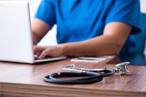 A female healthcare provider offering telehealth services to patients