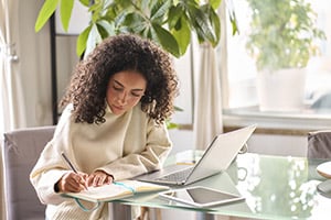 College student working on laptop