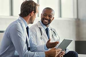 Doctor reading results to his patient