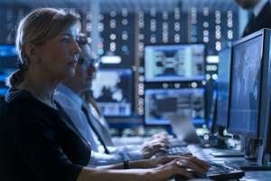 Government personnel working on cybersecurity measures