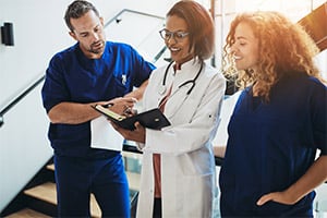 Healthcare providers speaking to each other