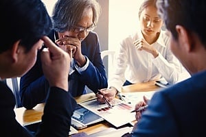a crisis planning and management meeting among business partners