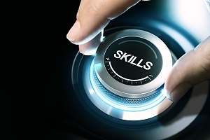 a hand on a knob showing that you have to boost your business skills for careers in it