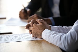 a meeting for case management for ROI in CRM