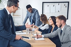 an outsourced CIO speaking with his new team of executives