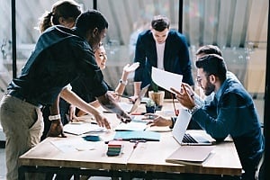 business partners working with an IT strategy firm