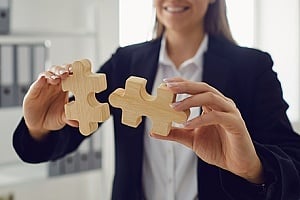 business woman combining IT strategy with business strategy