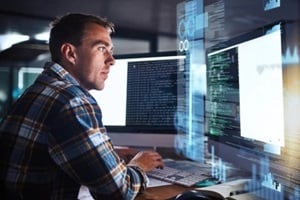 businessman hand typing or working on laptop for programming about cyber security