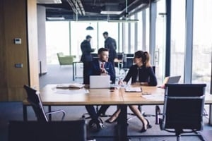 company executives in a meeting