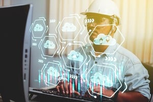 construction crew member uploading project management data