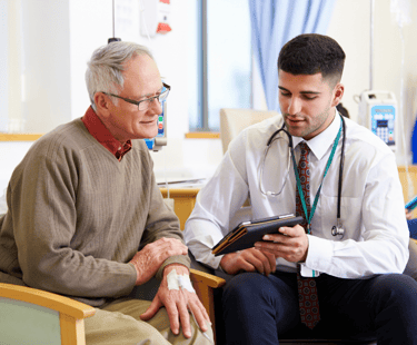 doctor consulting with patient using digital tools