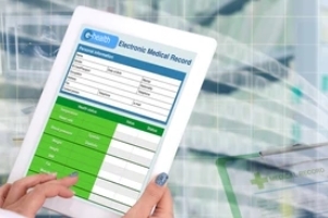 doctor holding tablet with patient record