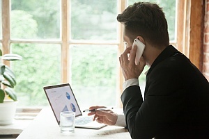 Employee on phone requesting software information 