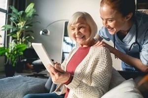 happy old lady with nurse