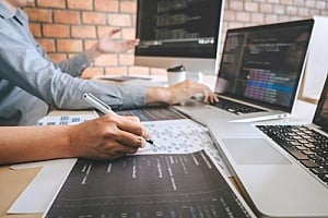 employee at an office working with materials they need