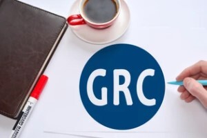 man drawing grc with coffee diary and pen