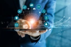 man holding tablet with digital strategy concept