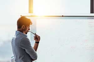 man reviewing a business continuity plan as part of his incident response plan