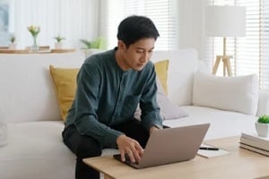 man working from home during covid