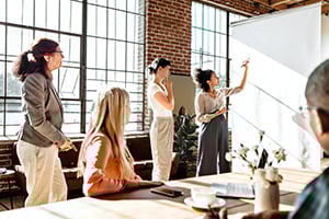 Team in a meeting speaking to each other