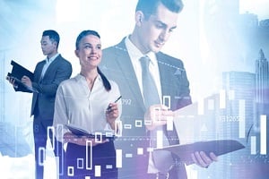 three young diverse business people working together in blurry abstract city with double exposure of financial charts