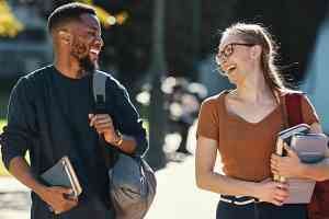 two college students walking to their class together