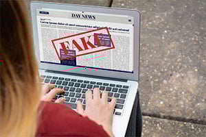 woman runs into fake website