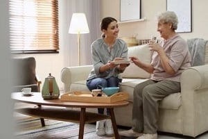 women caring for senior lady