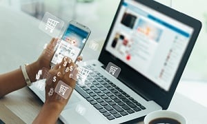 women using her phone to order merchandise online during pandemic