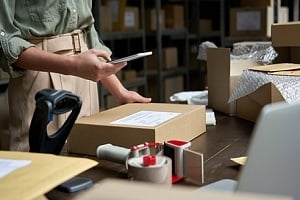 young women managing packages digitally 